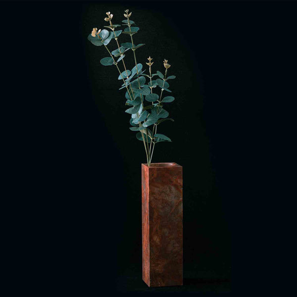 A unique red natural marble vase, combining natural aesthetics with exquisite craftsmanship